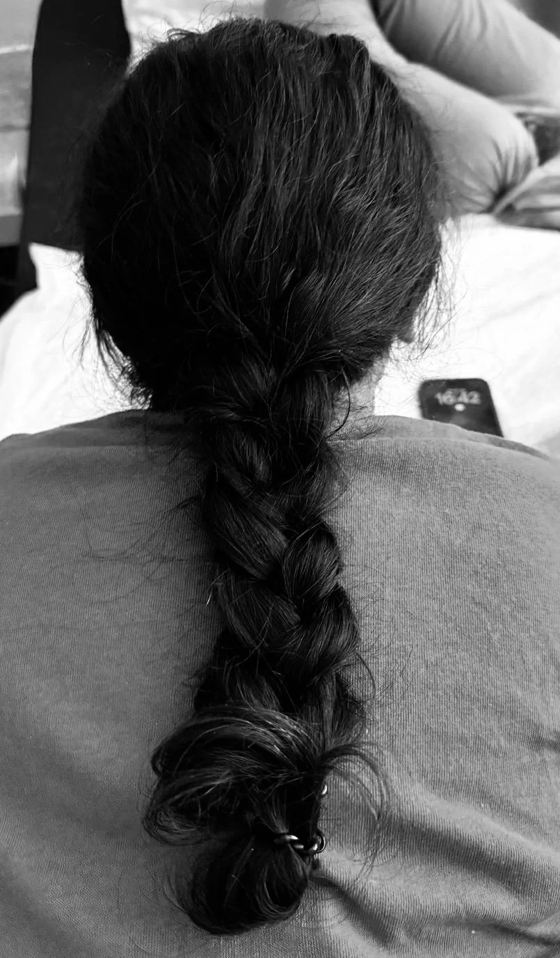 hair braid used as part of a  hair oiling ritual