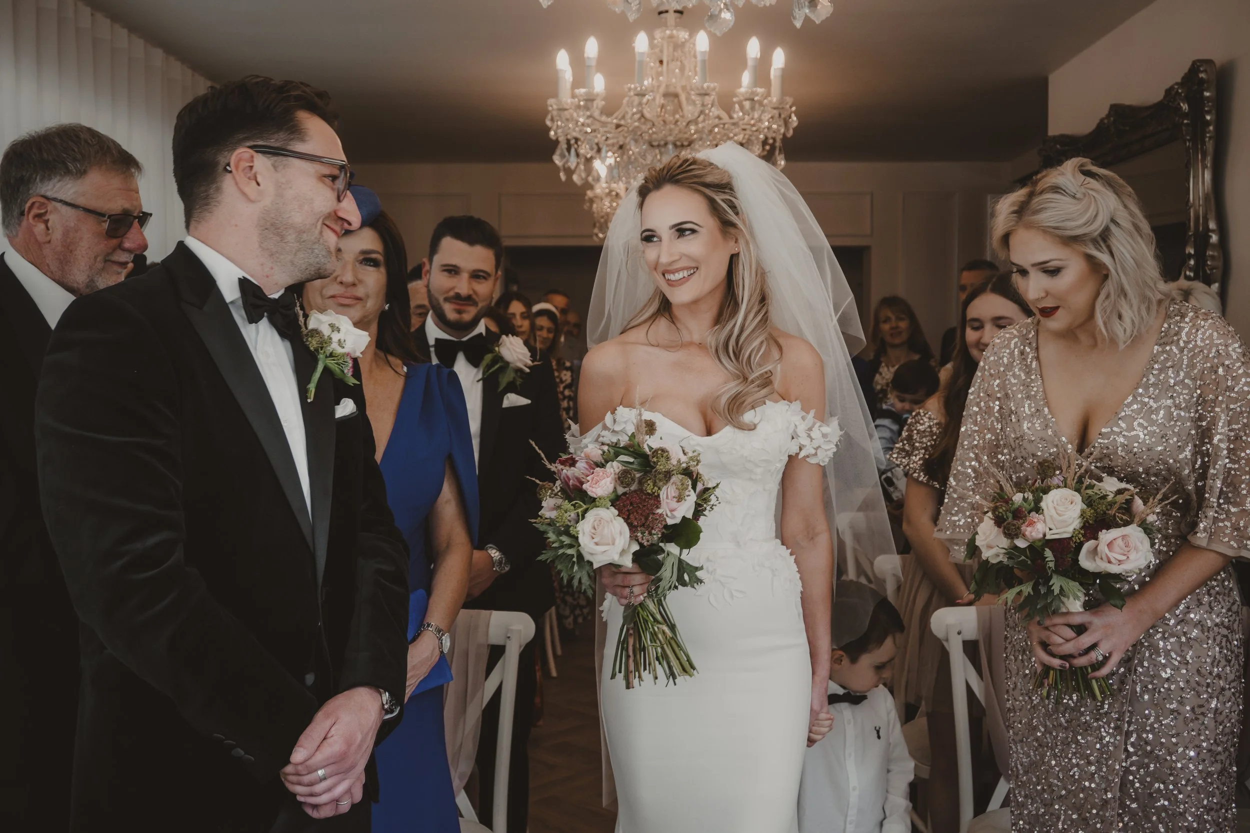 Walking down the isle at The Old Vicarage Boutique Hotel Southwell. Classic black tie attire .