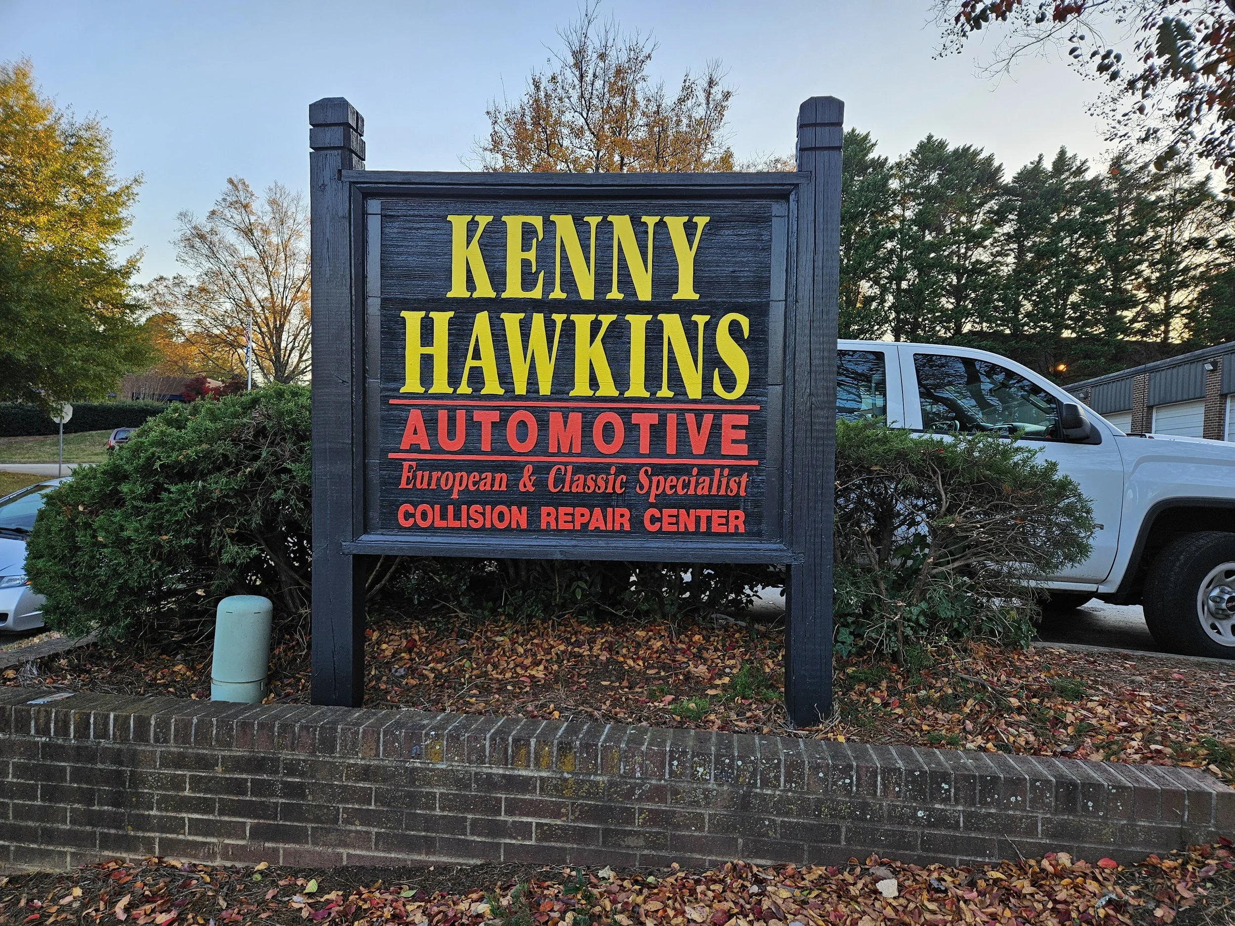 A Fresh New Look: The Reconditioned Kenny Hawkins Automotive Sign Shines Again