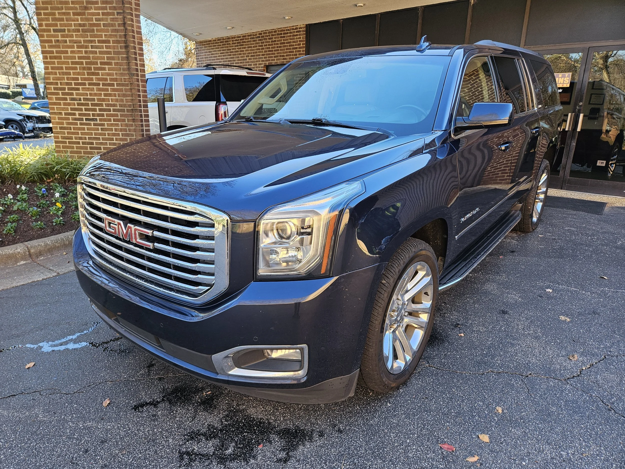 Blue GMC. post repair. Kenny Hawkins Automotive Cary / raleigh auto body repair