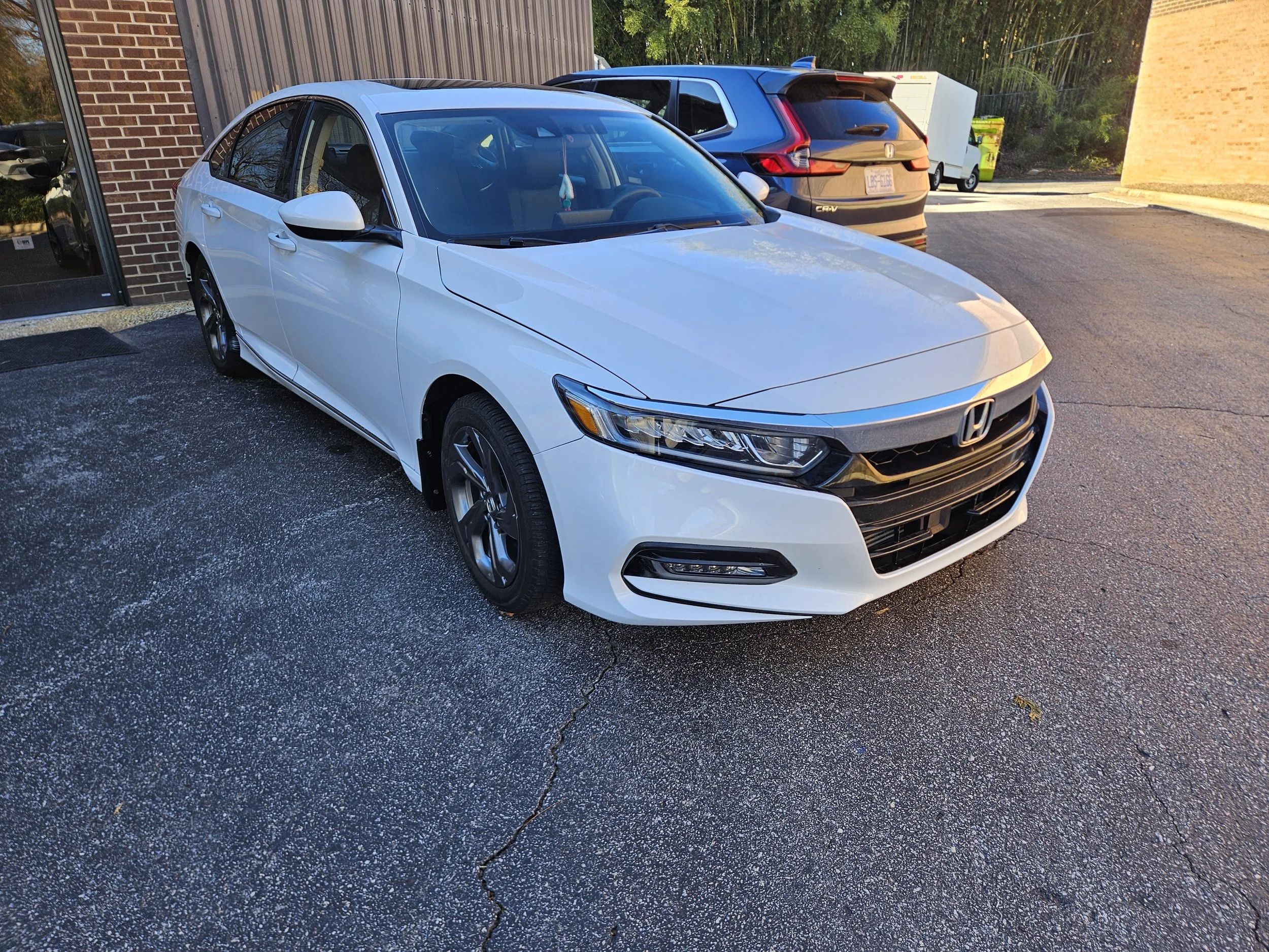 White honda accord. post repair. Kenny Hawkins Automotive Cary / raleigh auto body repair