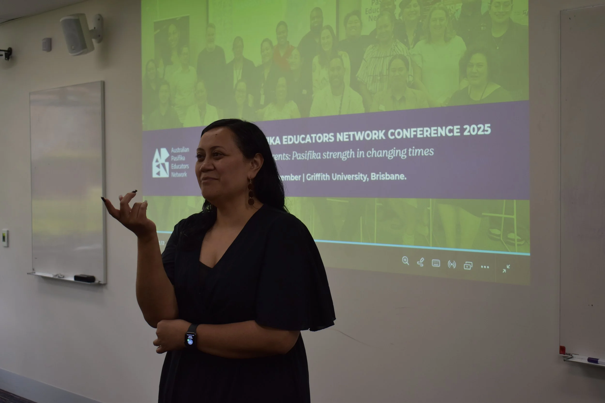 Bronwyn presenting in front of screen