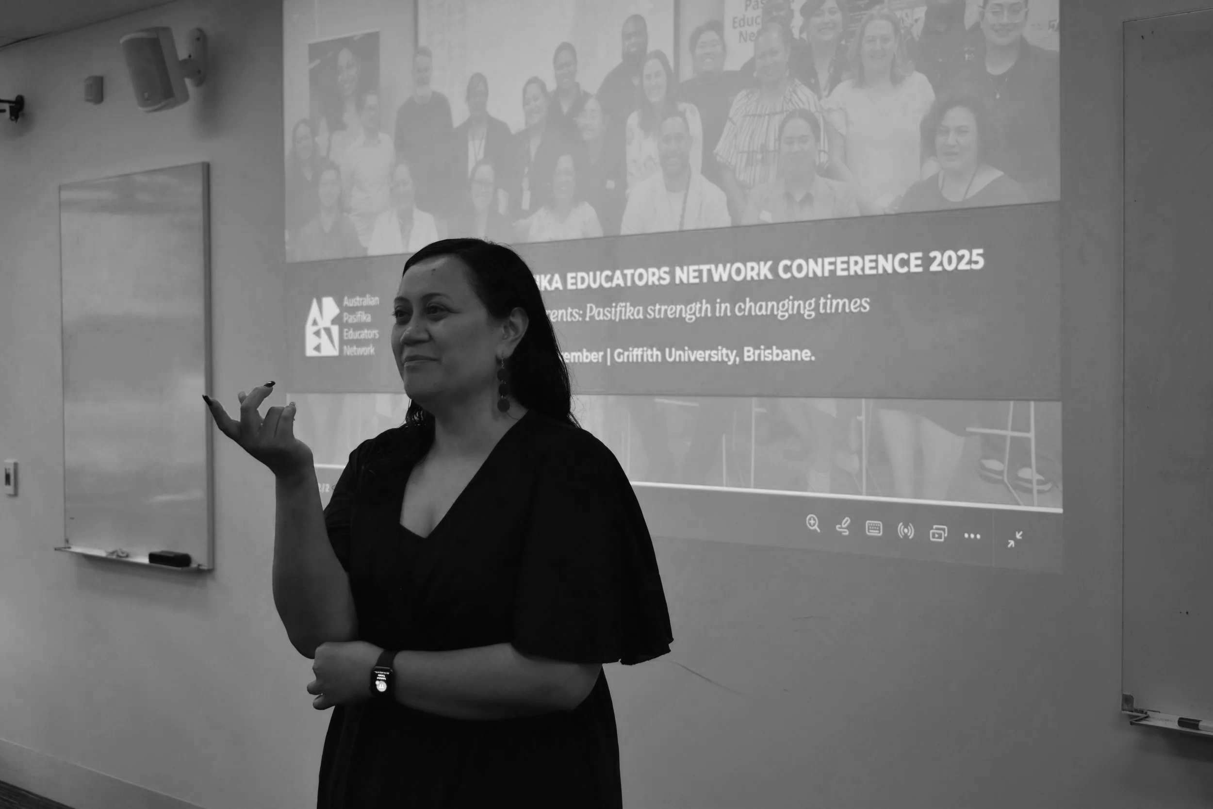 Bronwyn presenting in front of screen