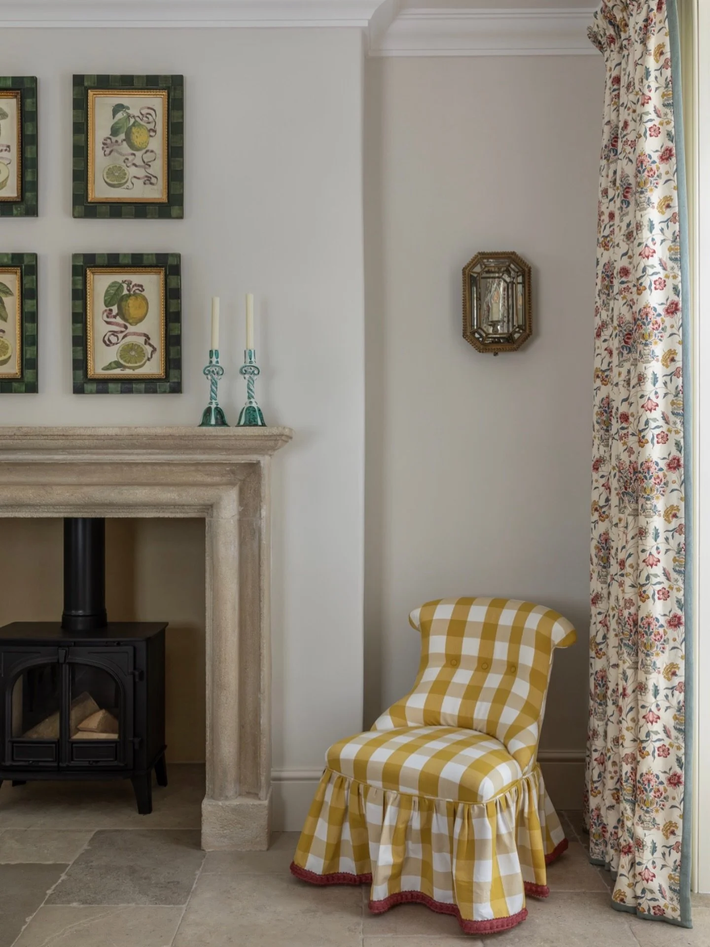 This is the dining area in a kitchen in Oxfordshire.  This was originally a dark and pokey room which we opened up into the kitchen and the previous fireplace was squished in the corner with an ugly surround.  We created a new chimney breast centred 