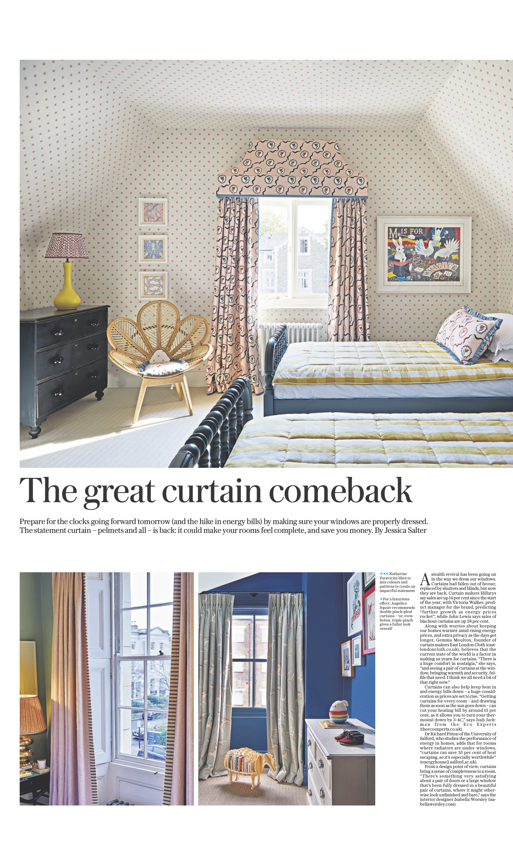 A bedroom with two twin beds, patterned curtains, a window, framed art on the walls, a black dresser with a yellow lamp, a rattan chair, and decorative wallpaper.