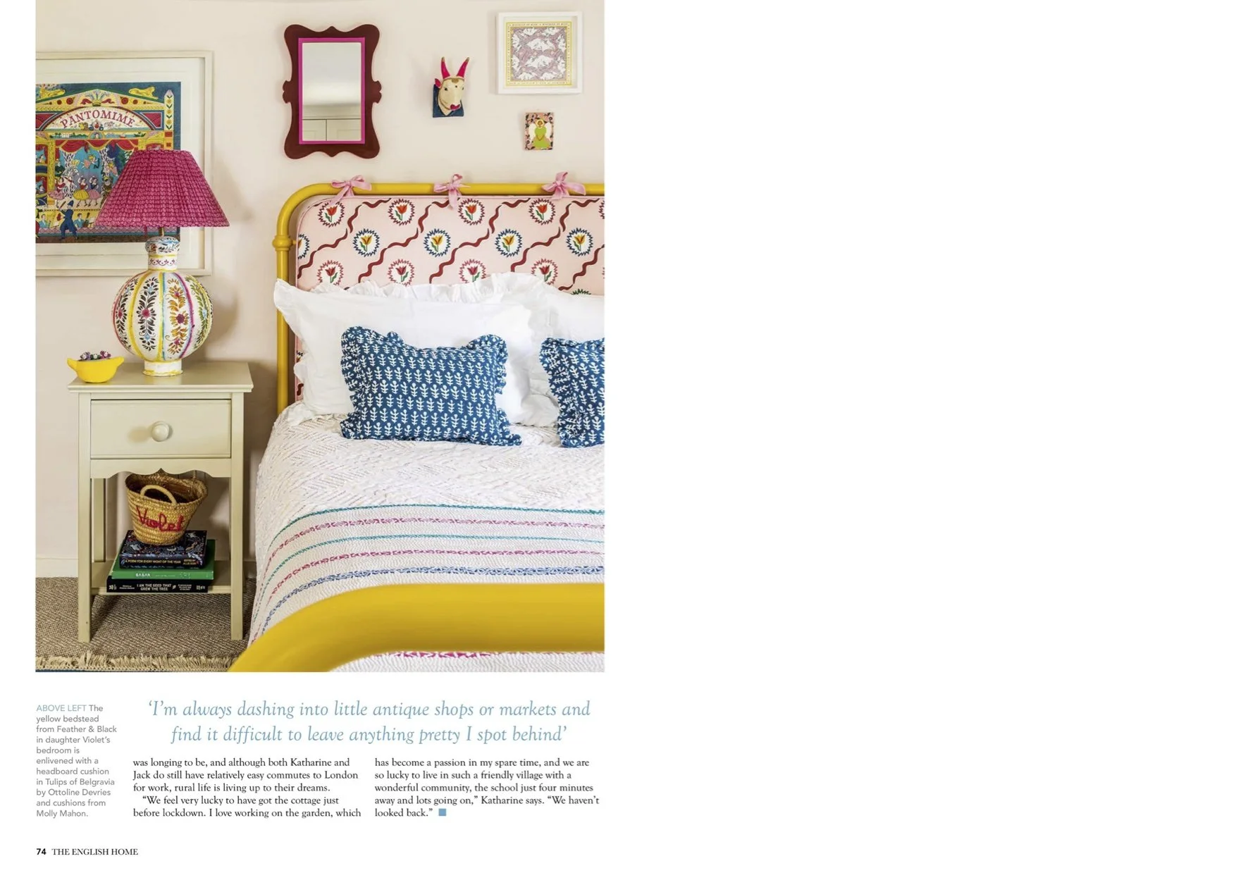 A cozy bedroom decorated with colorful, vintage-inspired furniture and accents, including a yellow bed frame, patterned pillows, a pink and white headboard, and decorative wall art and a large patterned lamp.