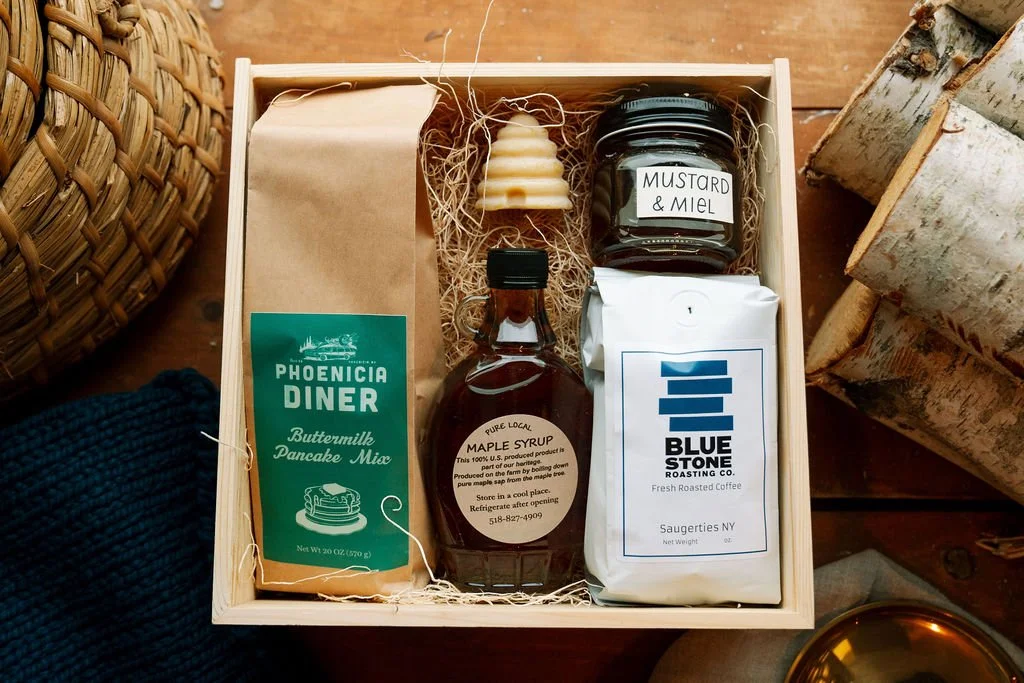 Deluxe gift box with Mustard & Miel honey, Phoenicia Diner pancake mix, local maple syrup, and Bluestone coffee presented in a wooden gift box.