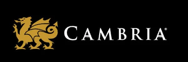 The logo of Cambria features a golden dragon on a black background, with the word 'CAMBRIA' in white capital letters beside it.
