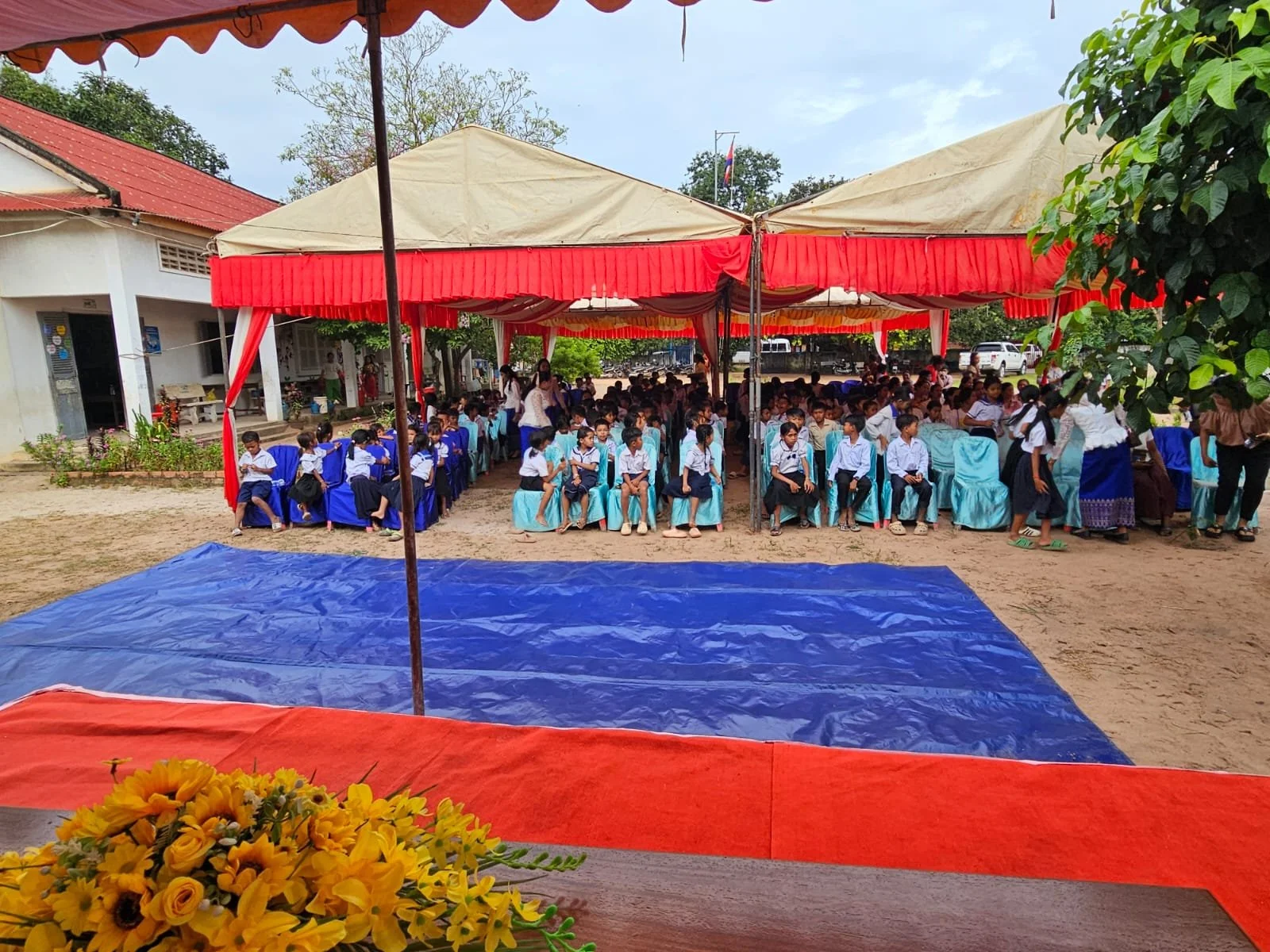 A large gathering to celebrate the new school