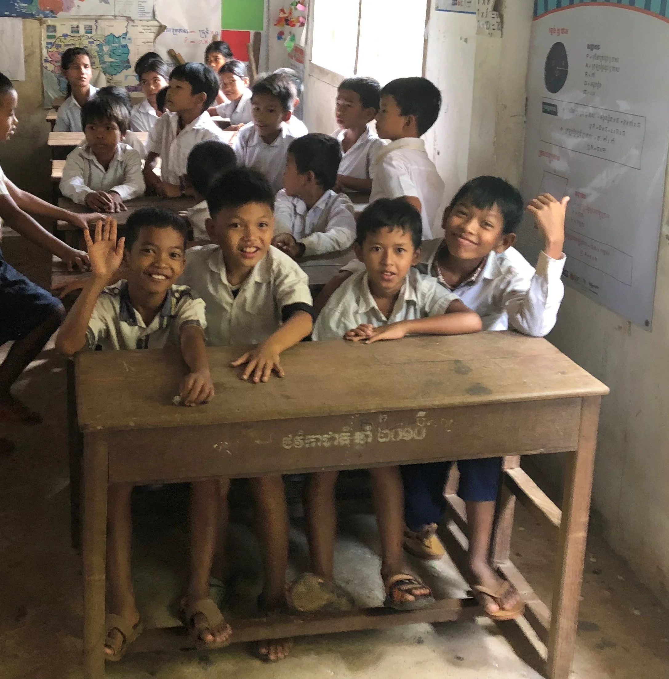 Students were 3 or 4 to a desk