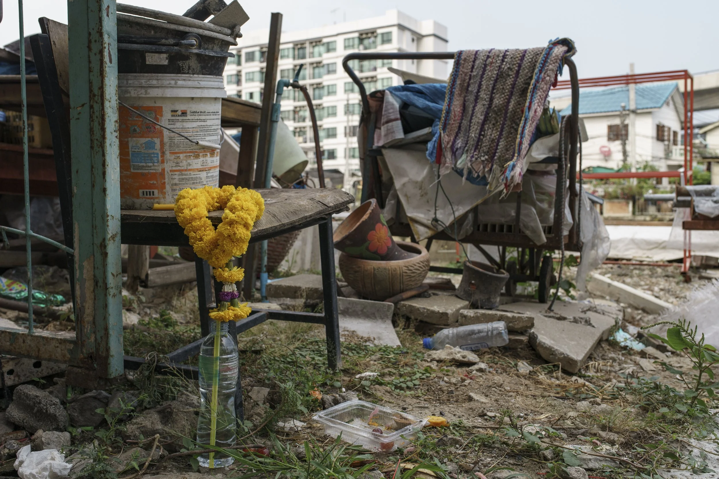 A fortune garland made of marigolds was placed in front of a community resident's house
