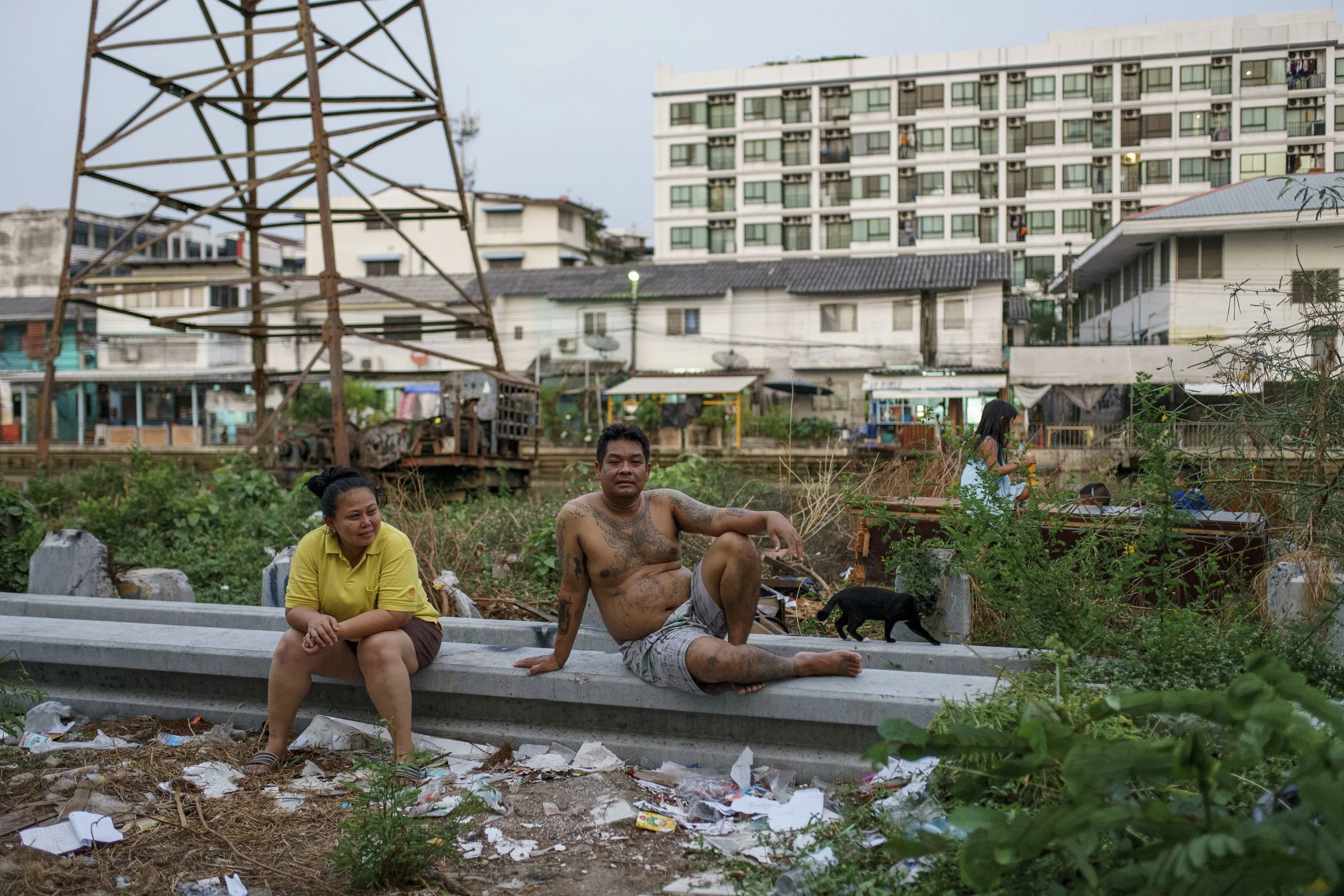 Community residents spending time outside their house in the evening