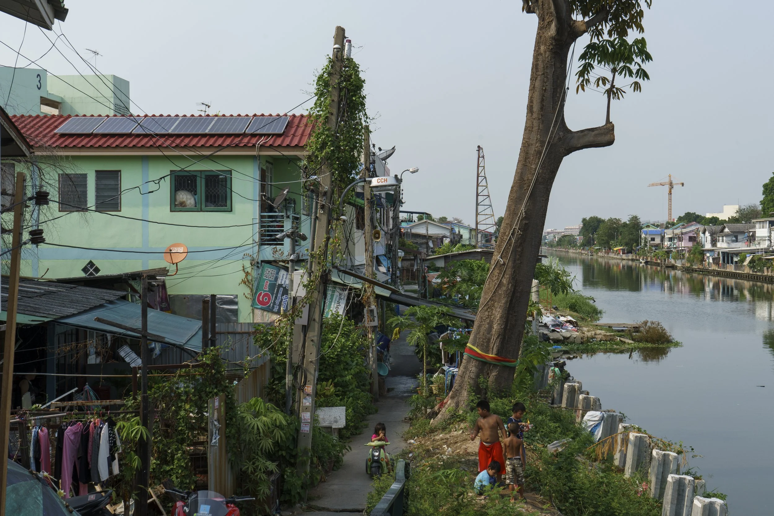 Children enjoy playing with each other at Bang Bua Saphan Mai 1 community in the morning