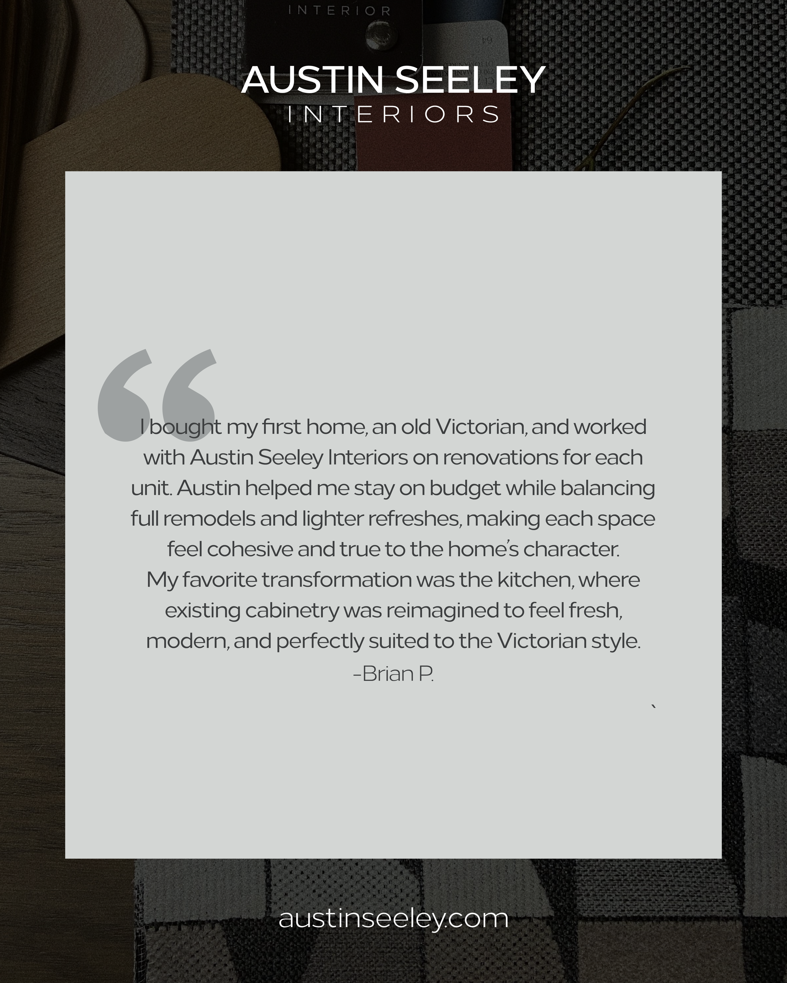 Contemporary living room with grey armchairs and striped rug.