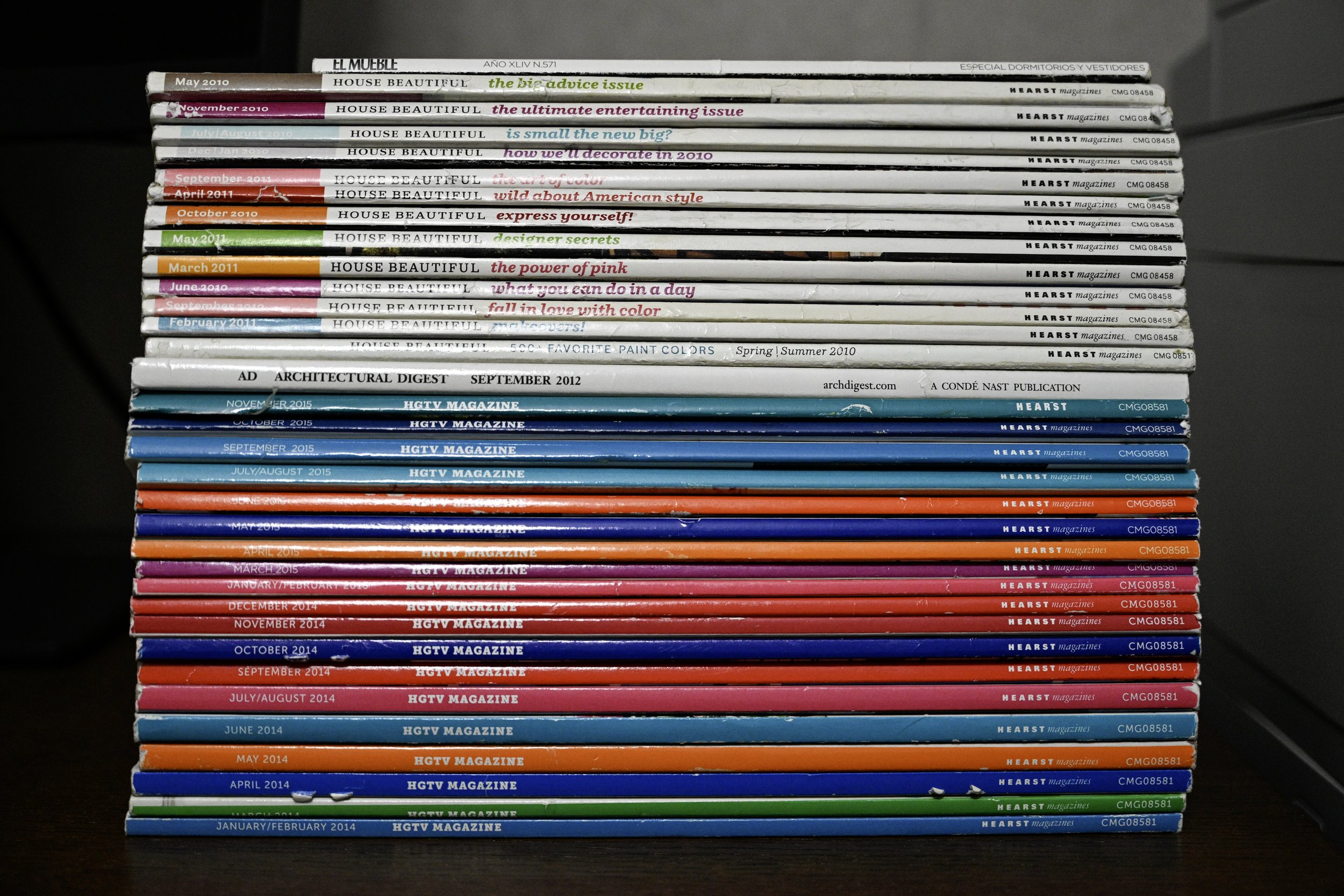 Stack of House Beautiful, HGTV Magazine, and Architectural Digest issues collected over the years, reflecting a lifelong passion for interior design and inspiration for a Philadelphia interior designer.