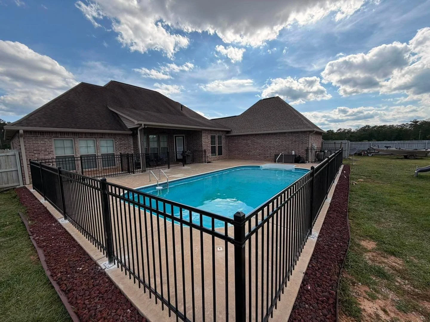 ☀️ School is officially OUT for the summer, and the kids are heading straight for the pool! 🏊&zwj;♂️✨

We just finished installing this sleek, pool fence over in Woodworth, LA to give these homeowners total peace of mind. It meets local safety codes