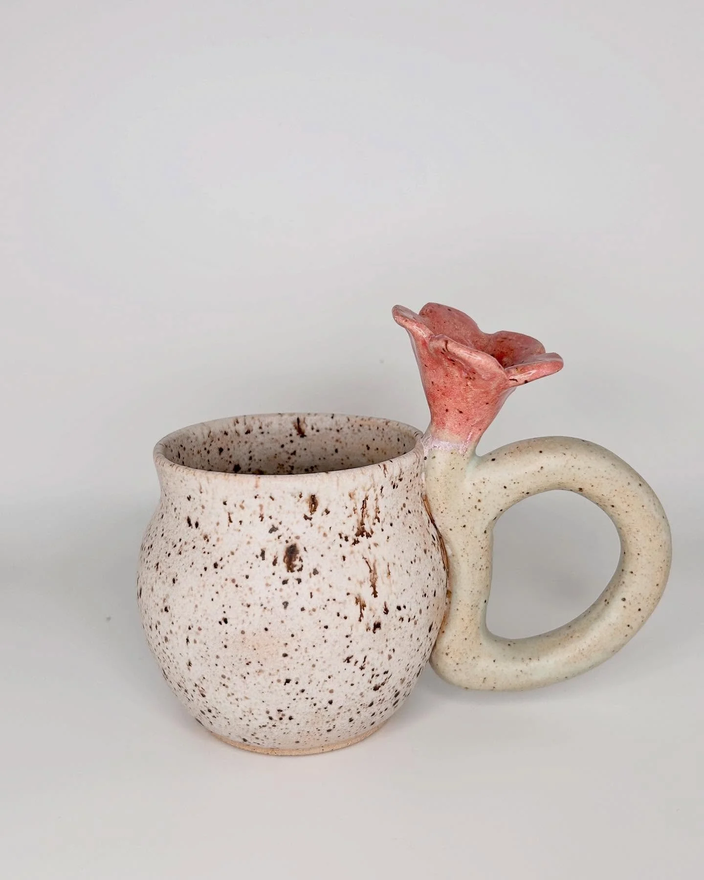 Super duper in love with these new flower handle mugs! They were a bit challenging to create and unfortunately one of them has cracks, but I learned a lot in the process and would love to make more 🌸

#handmadeceramics #ceramicmug #wheelthrown #clay