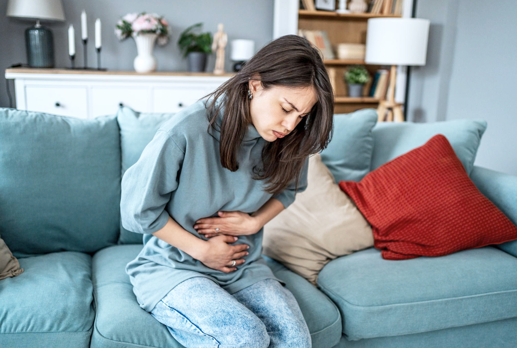Woman with IBS and gut pain — functional medicine treatment Toronto with Dr. Laura Brass ND