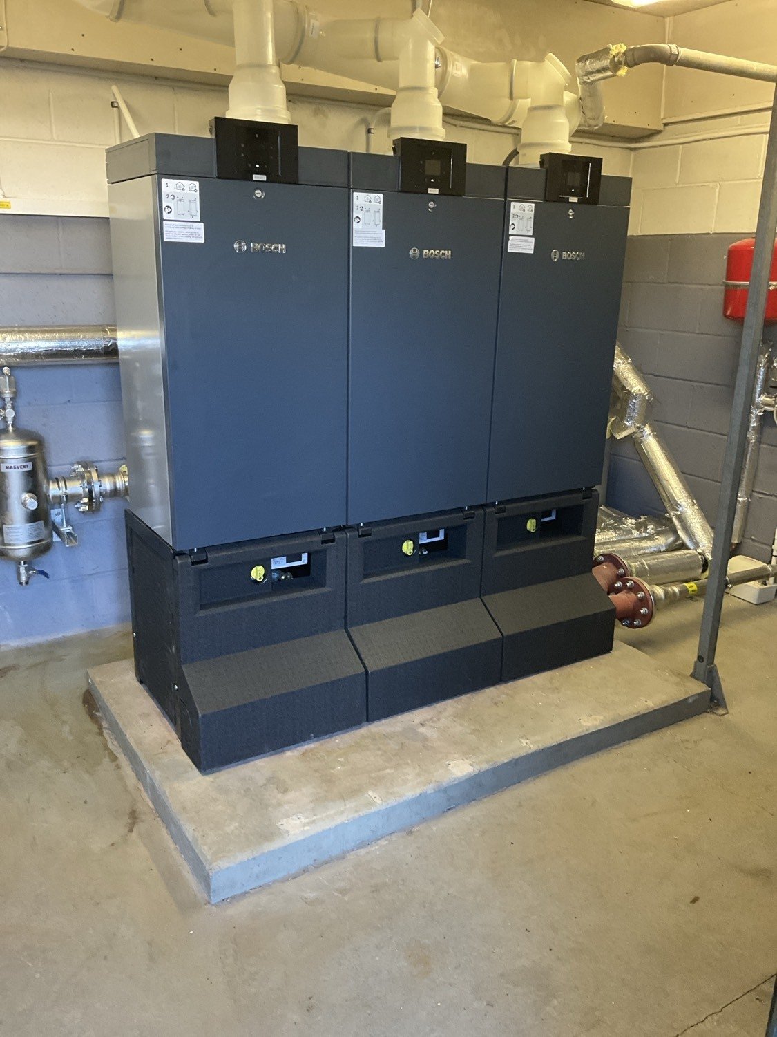 A metal appliance with a label displaying technical specifications such as model number BHCM P20, serial number 2504-072-20K-0002, gas type G20, and electrical rating 230 volts, 50Hz, 68 watts.