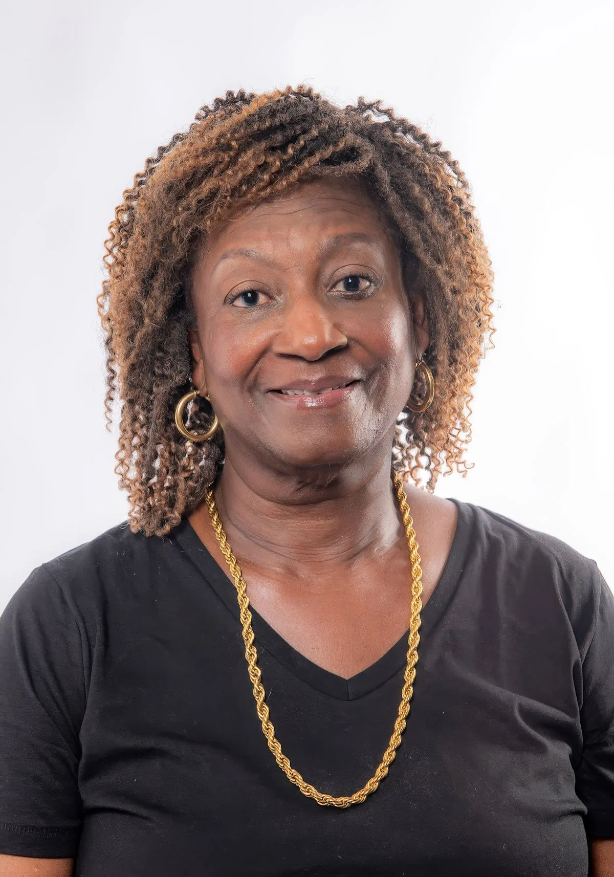 A portrait photo of Mary Owusu-Hirsch