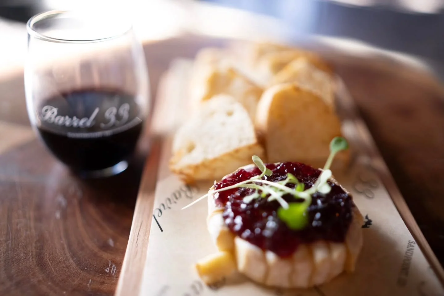 ✨ Now you see it, now you don’t. ✨
Have you tried our baked brie with sweet-heat huckleberry pepper jelly? It’s a true Barrel 33 staple. Perfect for a midweek treat—whether you’re soaking up sunshine on the patio or hanging i