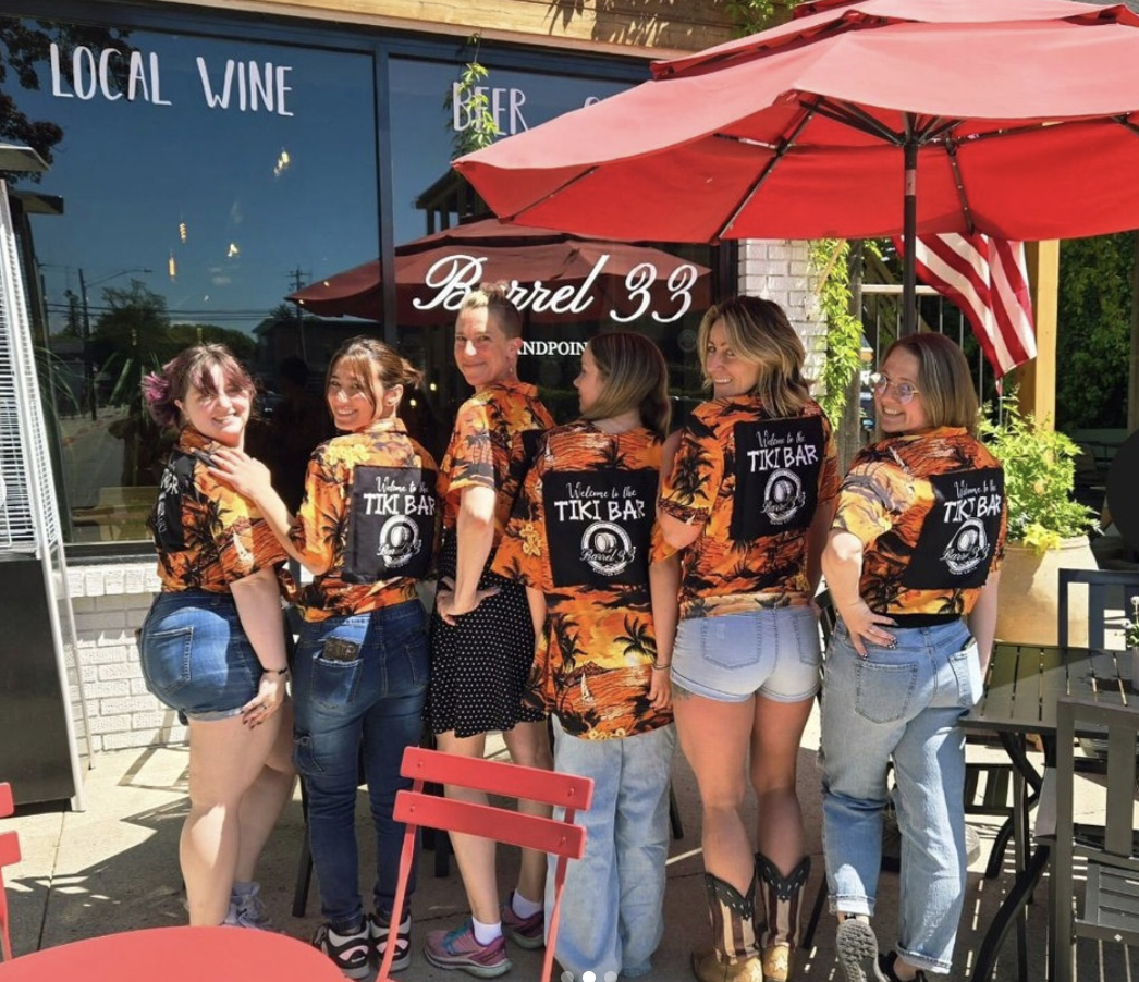 A group of Barrel 33 staff in Tiki Bar t-shirts