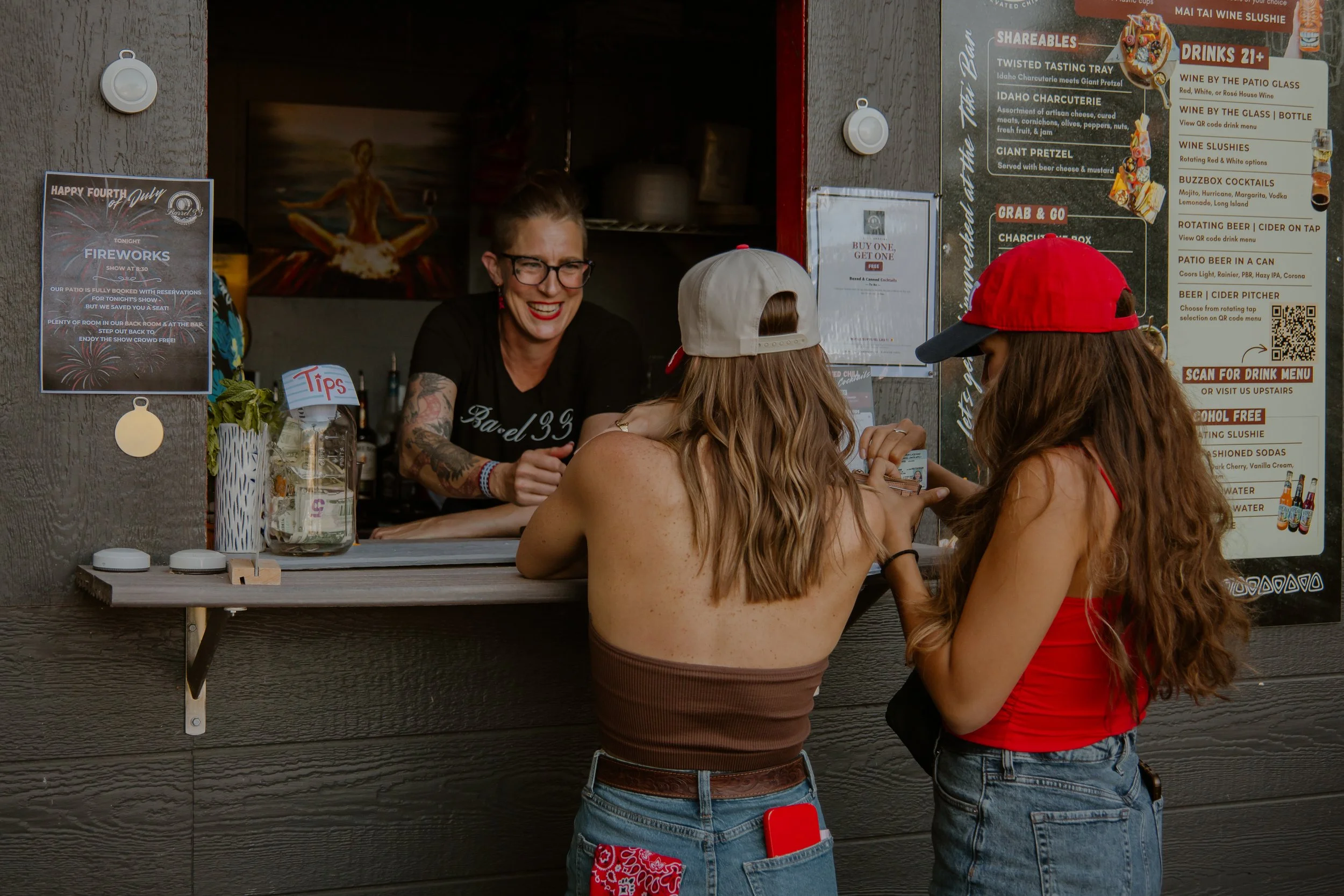 2 women ordering drinks at the Tiki Bar