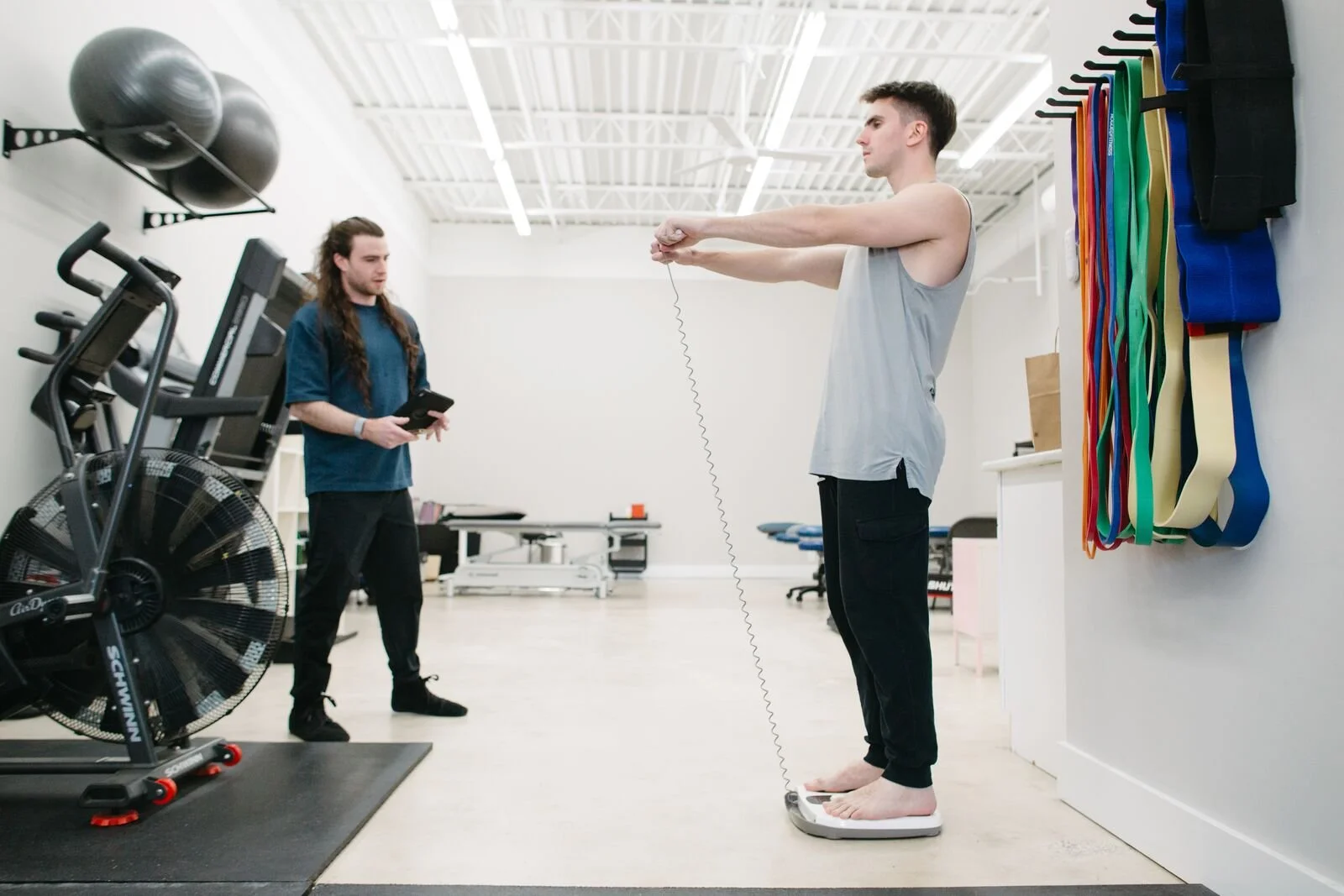 CoGym coach conducting a fitness assessment at the Durham training studio