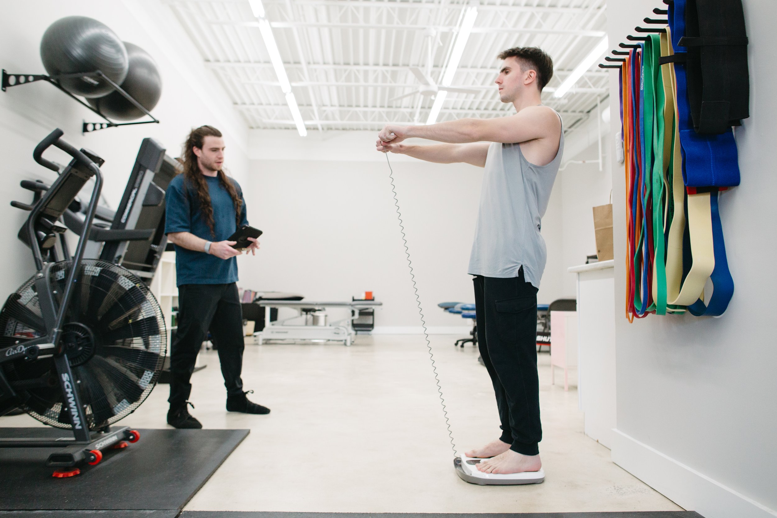 CoGym coach conducting a fitness assessment at the Durham training studio