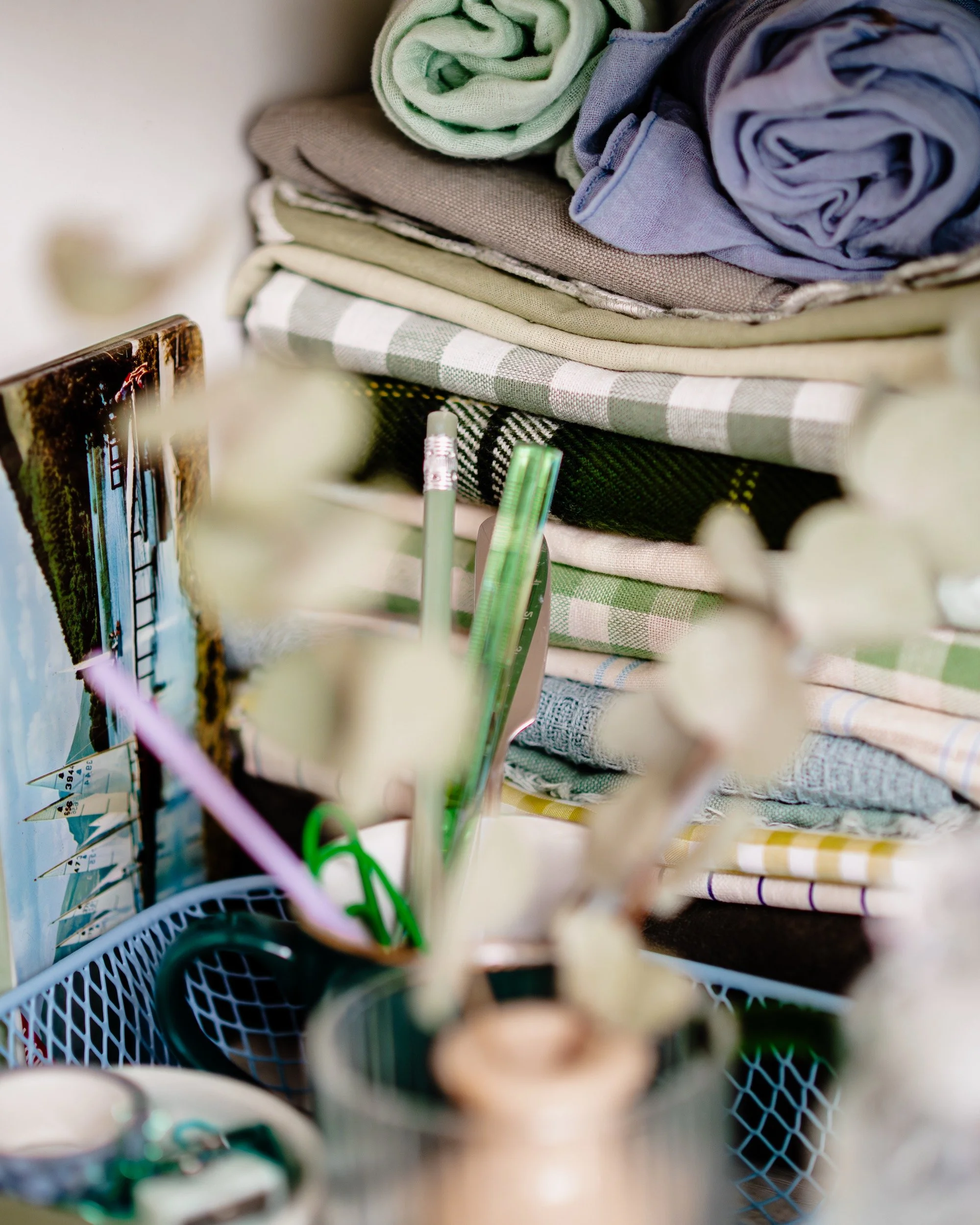 bluey green props, focused on folded fabrics