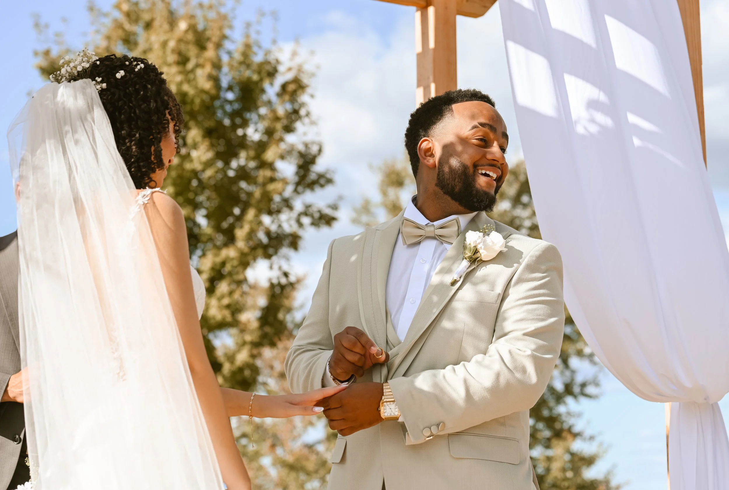 Groom Exchanging ring on wedding day 