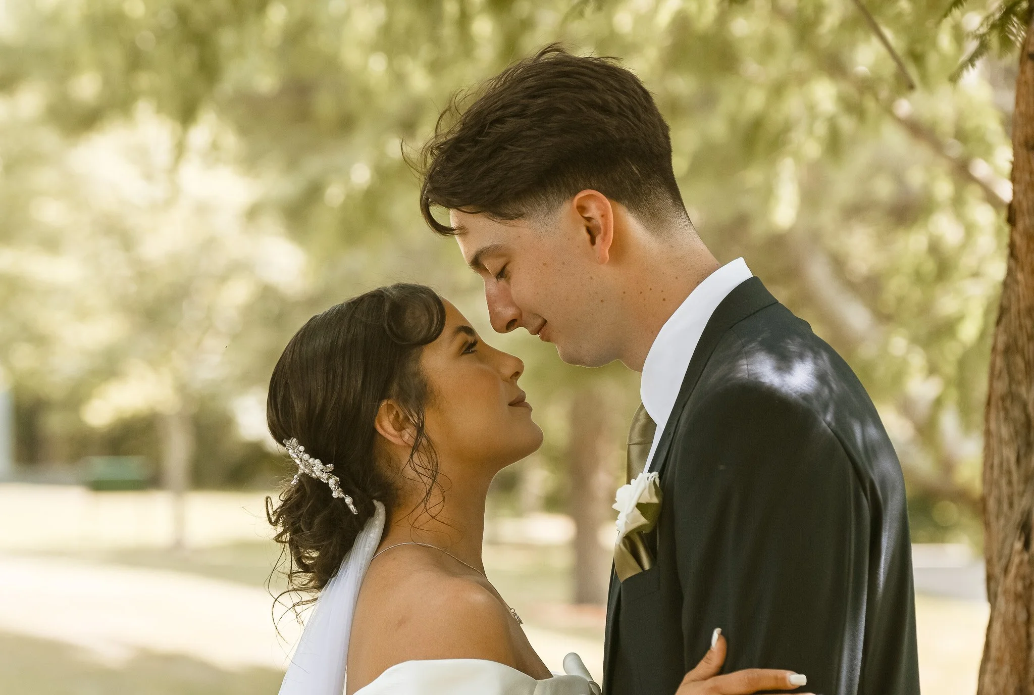 Bride and Groom face to face at Green hill park during first look with groom.