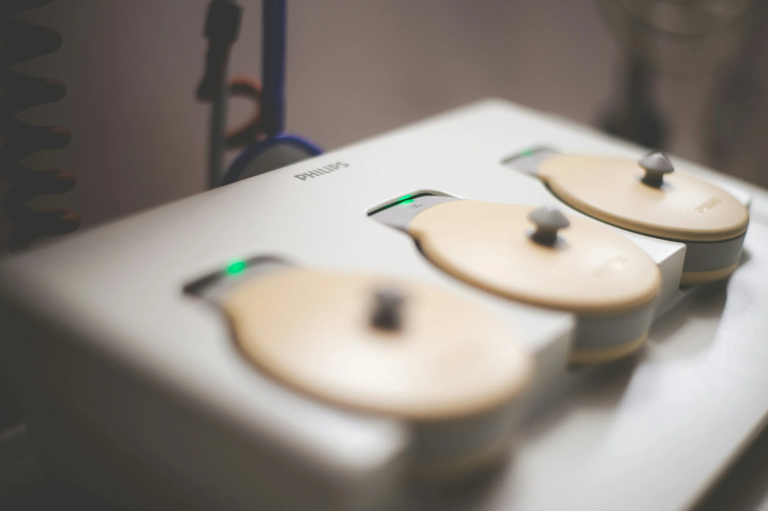 A stimulator device used to run a gentle current between acupuncture needles