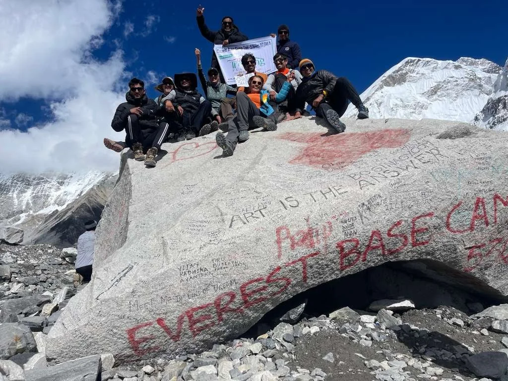 Group of hikers gathered on top of Everest Base Camp