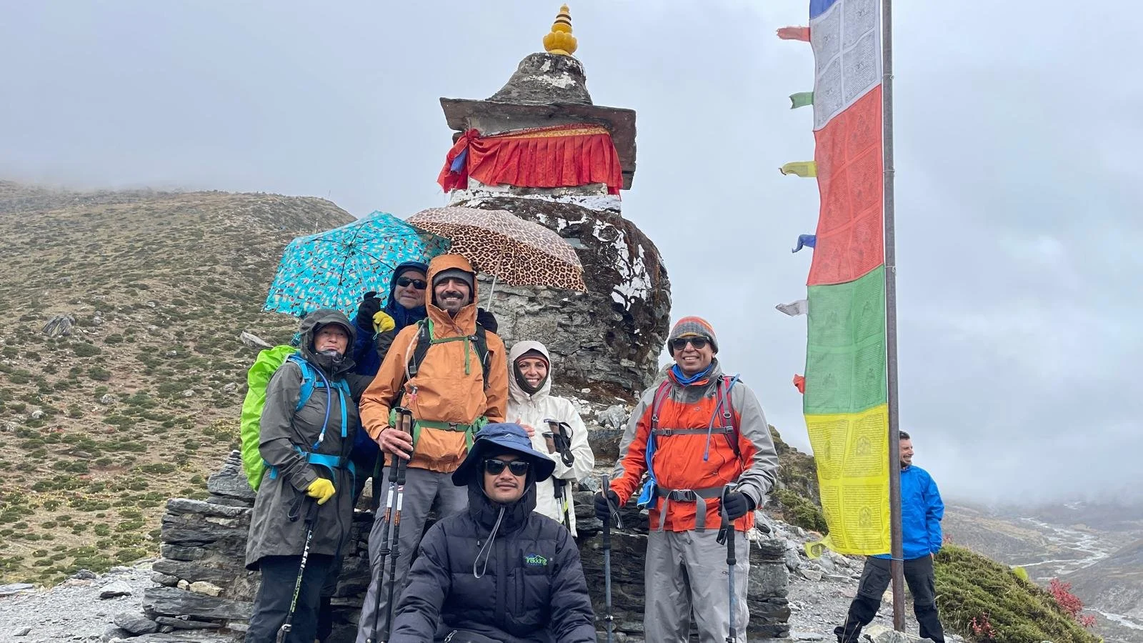 A happy climbing group on Everest with our three expert guides