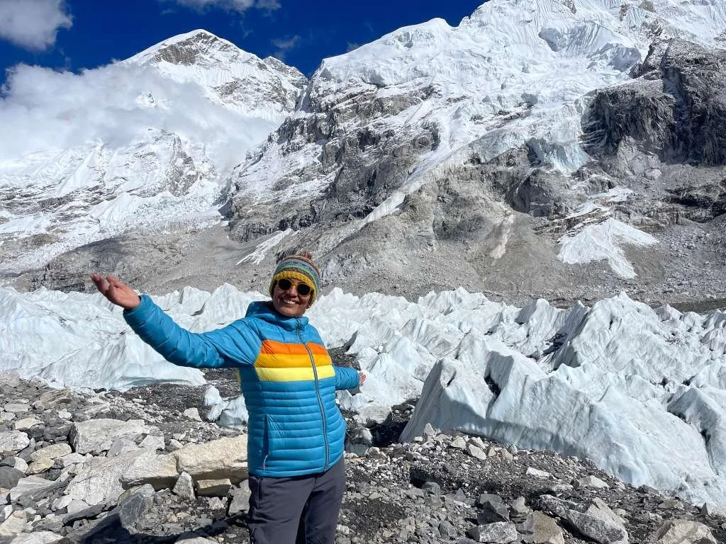 Anu stands at Everest Base Camp