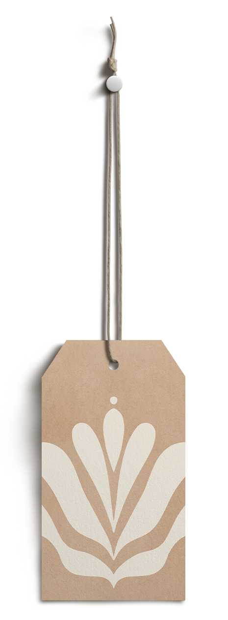 A beige tag with a white floral design, attached to a gray string with a white bead at the top.