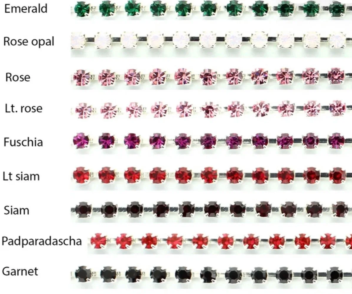 A collection of rows of colorful gemstone studs, including emerald, rose opal, pink rose, light pink rose, fuchsia, light siam, siam, padparadscha, and garnet, arranged horizontally.