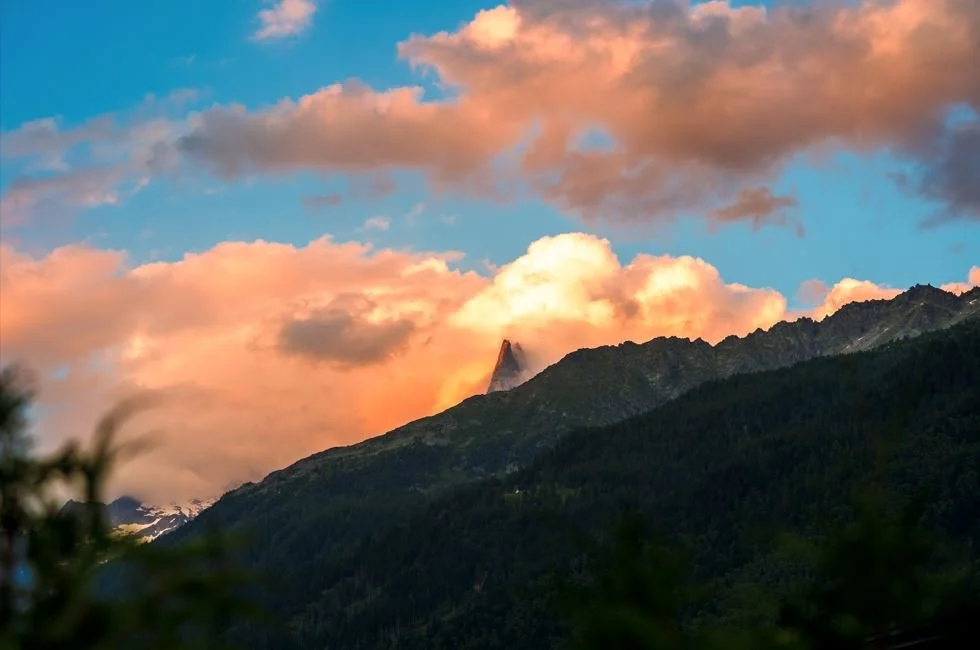 The Alps nestled in the colorful clouds of a French sunset - Chamonix, France