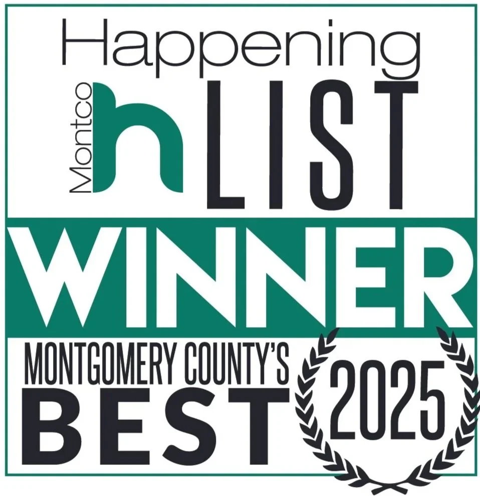 A graphic with the text 'Happening Montco' at the top, followed by 'h LIST WINNER' in large font, and 'Montgomery County's Best 2025' at the bottom, encircled by a laurel wreath.