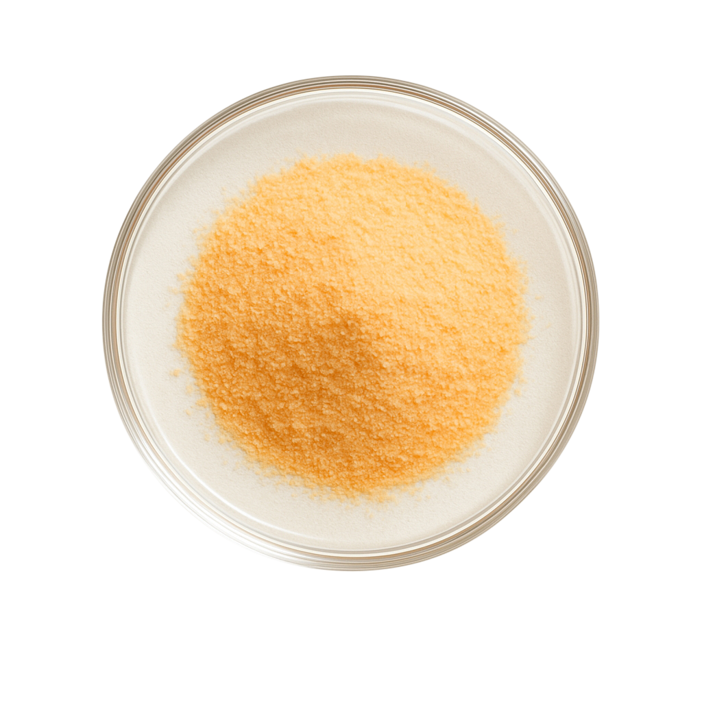 Yellow powdered substance on a white background.