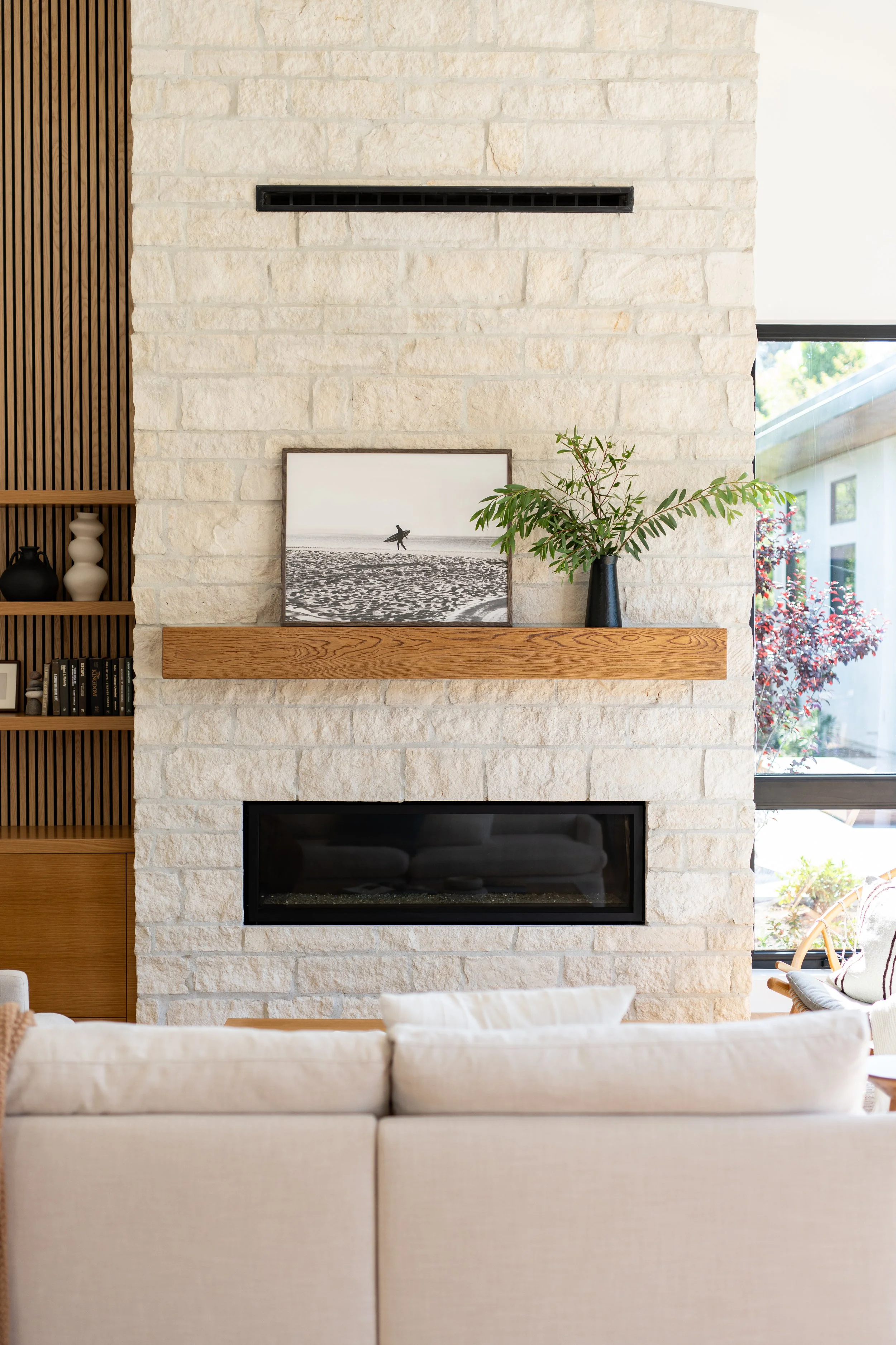 Limestone Fireplace Centered in Living Room