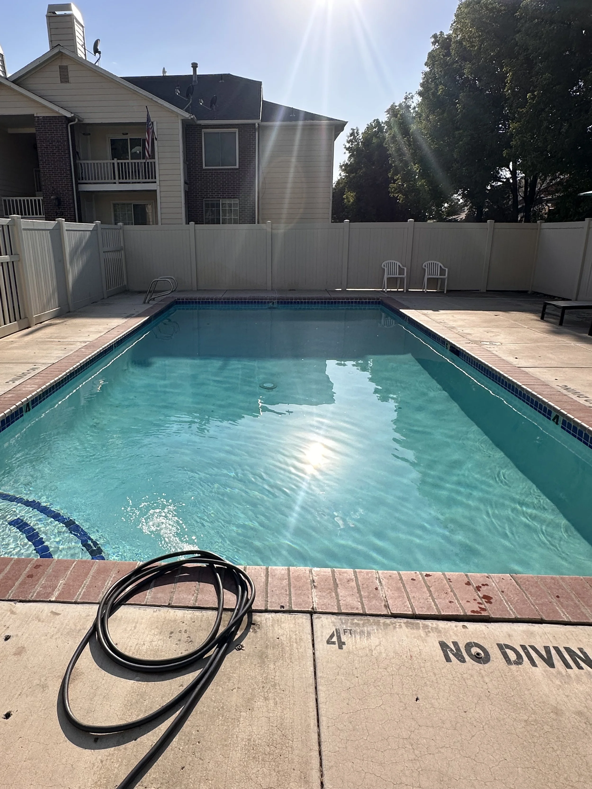 Final picture showing clear blue water, and clean white plaster. 
