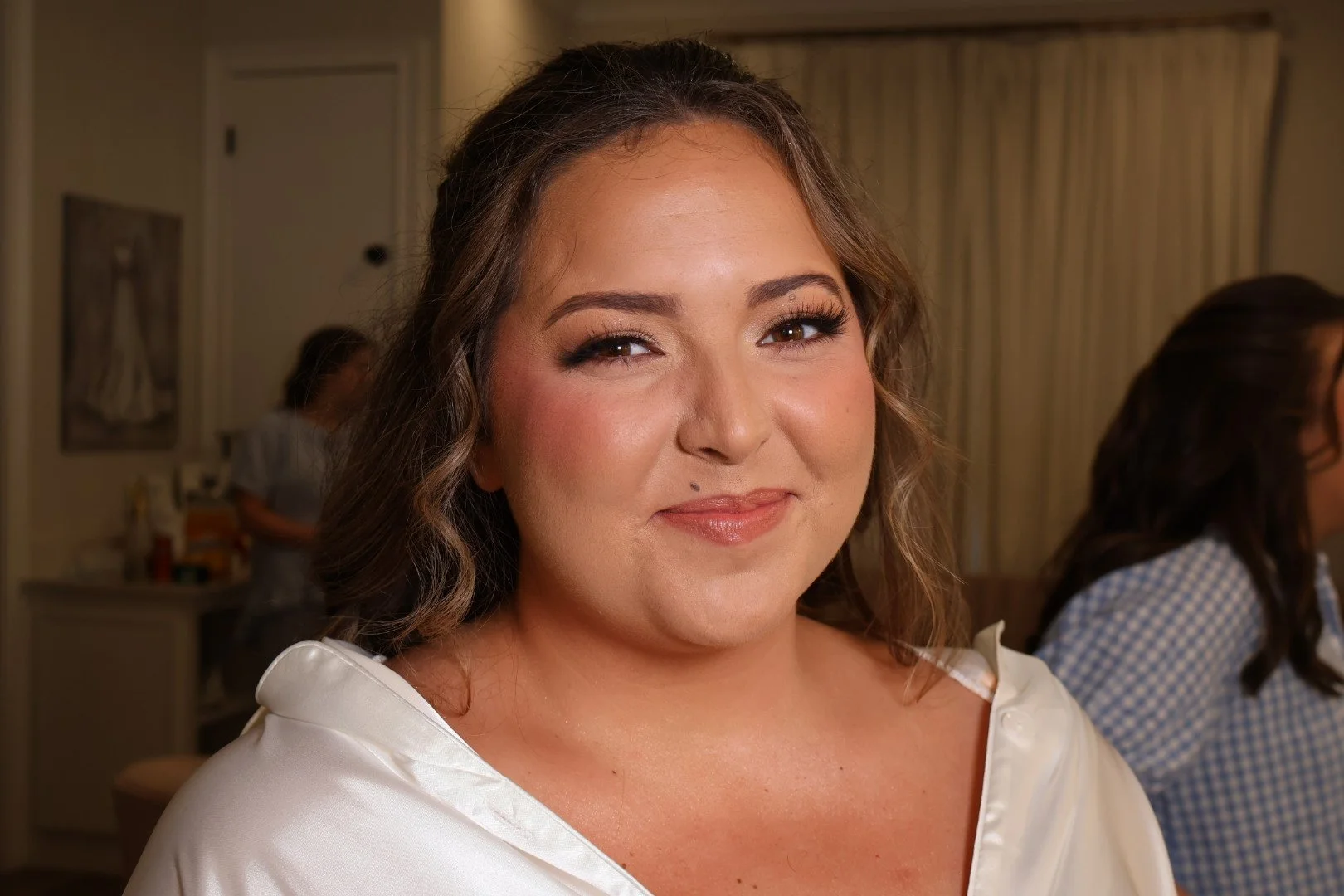 Full glam bridal makeup look with bold eyes and flawless complexion for luxury wedding