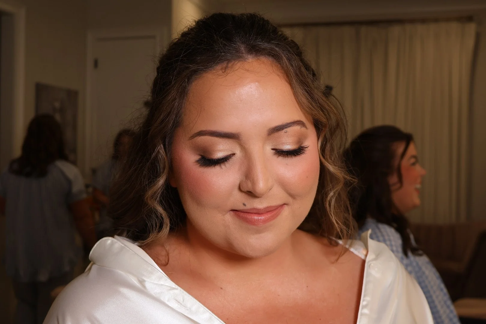 Luxury bridal makeup and soft glam hairstyle by Golden Girls Glam with glowing skin and loose waves