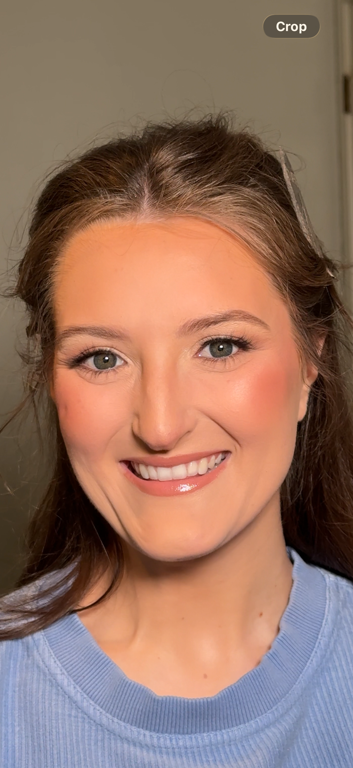 Close-up of soft glam bridal makeup with neutral tones, lashes, and glowing skin