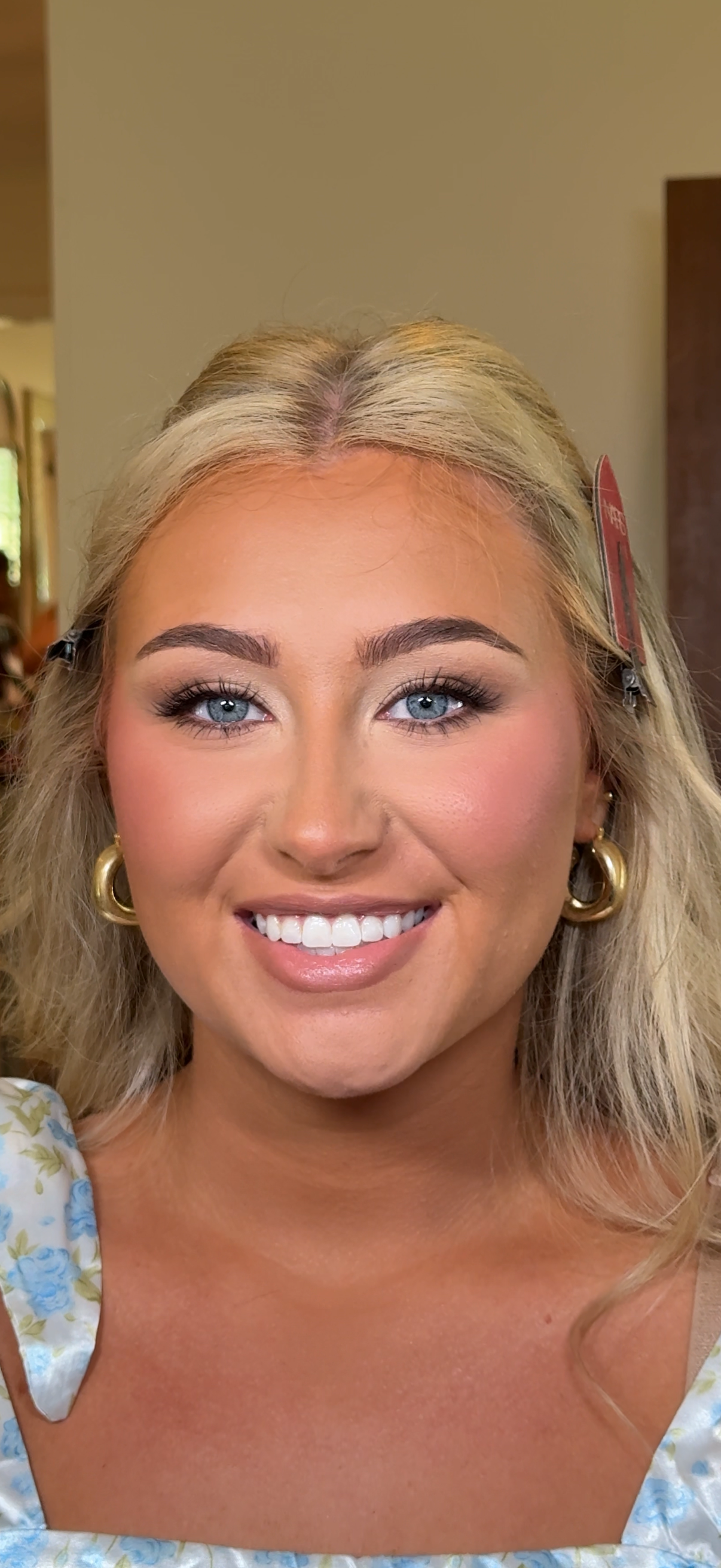 Full glam makeup with bold lashes and flawless complexion