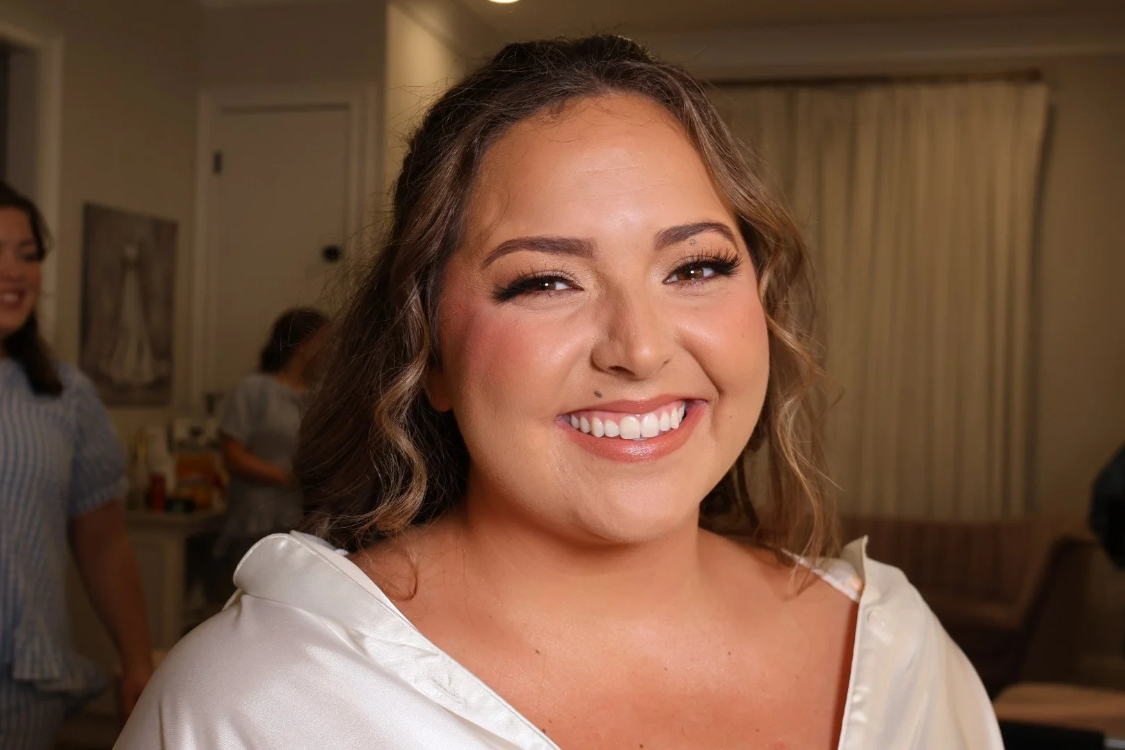 Full glam bridal makeup look with bold eyes and flawless complexion for luxury wedding