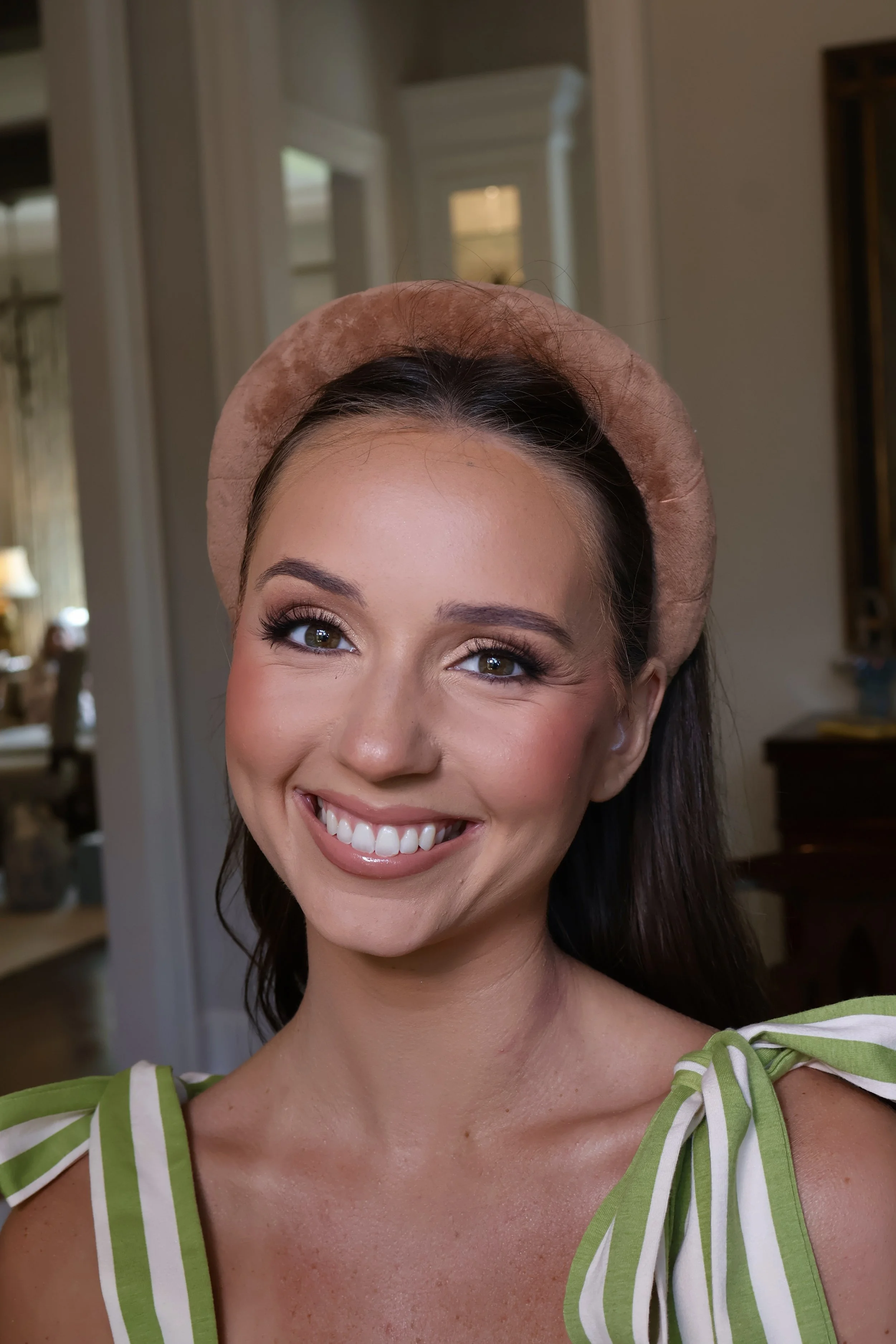 Soft glam bridal makeup and romantic Hollywood waves for elegant Southern wedding