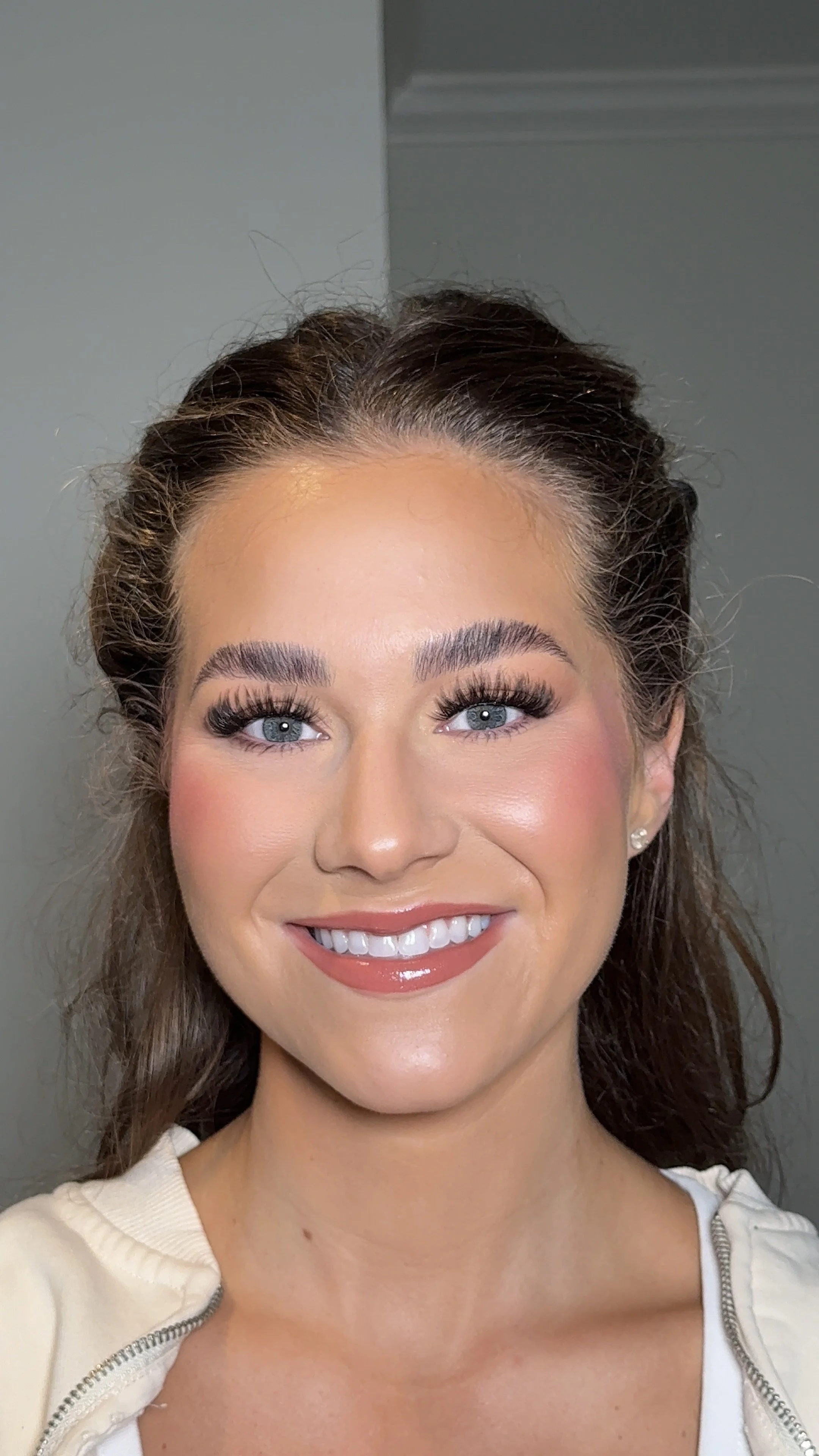 Full glam bridal makeup look with bold eyes and flawless complexion for luxury wedding